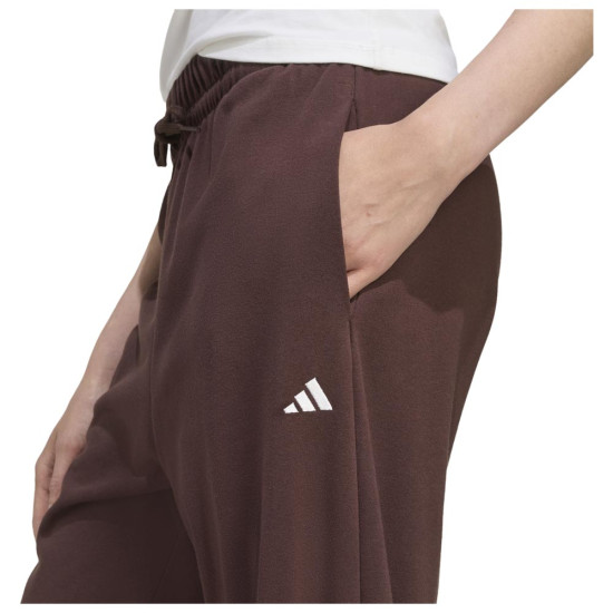Adidas Γυναικείο παντελόνι φόρμας Essentials Small Logo French Terry Cuffed Pants Adidas Γυναικείο παντελόνι φόρμας Essentials Small Logo French Terry Cuffed Pants